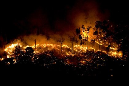 Fires burn the Amazon rainforest to clear the ground for cattle or crop farming in Sao Felix Do Xingu municipality, in Para State, Brazil.