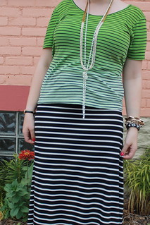Black and white striped jersey maxi skirt, striped ombré t-shirt with crisscross back, coral and pearl sandals, knotted pearls, ribbon and bead necklace, pavé cable link bracelet from J.Crew, bangles, etc.