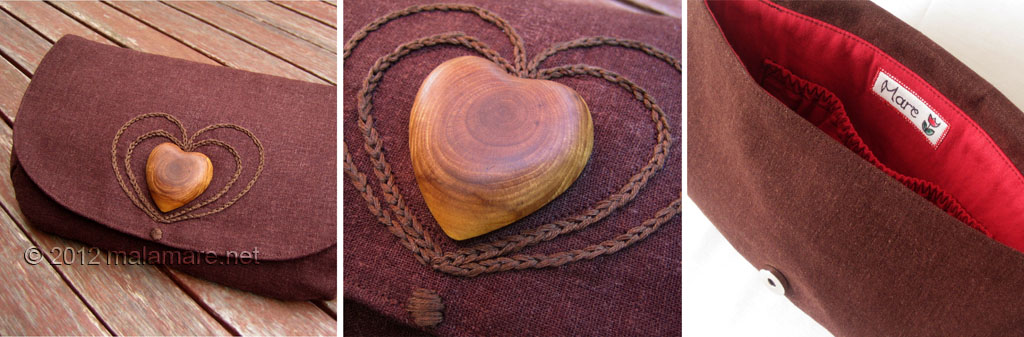 brown linen fabric clutch bag with olive wood heart and hand embroidered heart motif inside view and details