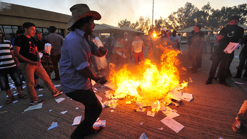 Protesters set fire to piles of voting materials after storming the office of the national election commission in Benghazi July 1, 2012. by Pan-African News Wire File Photos
