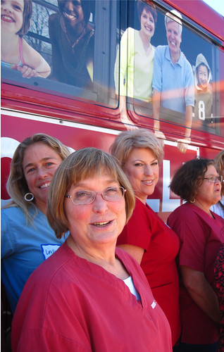 Donna and Nurses in front of bus