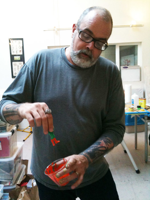Frank Kozik working on his Sucklord figures
