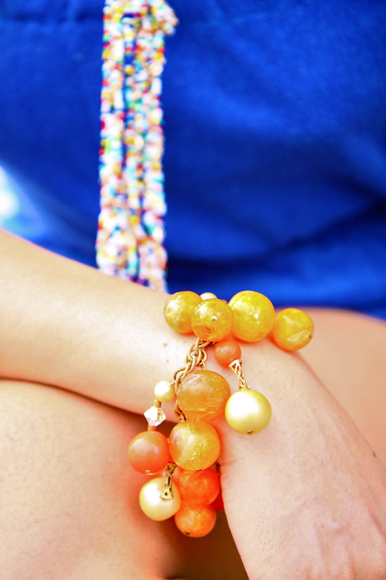 Bright baubles add fun to any beach outfit.