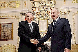Cuban President Raul Castro shakes hands with President Vladimir Putin of Russia during a visit by the Cuban leader to Moscow. Cuba and Russia are long time allies. by Pan-African News Wire File Photos