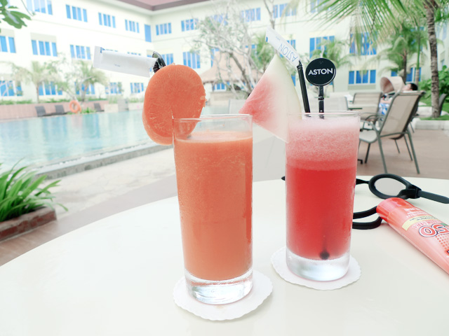 carrot juice and watermelon juice by the pool