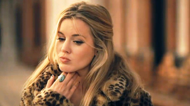 Caggie Dunlop faux animal fur jacket and turqoise ring