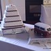 W063 - Four Tier Claret and White Wedding Cake with Swirls and Silver Dots and Grooms Cake.jpg