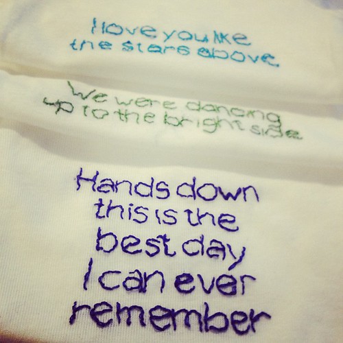 My gift to baby Drake: onesies embroidered with lyrics his mom & I sang along to (the Indigo Girls cd I bought her as a bribe, the Dasboard concert we went to)