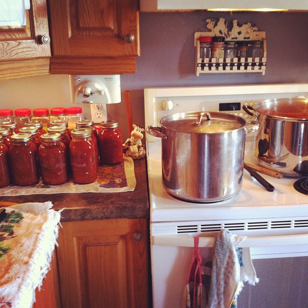 Today's canning: spaghetti sauce. 13 litres done, two full stock pots waiting. Whew. #canning #fresh #garden