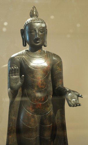 Standing Buddha with open palms mudra, giving, fearlessness, flaming aura on top of his head, detail of torso, metal, Art Institute of Chicago, Illinois, USA by Wonderlane