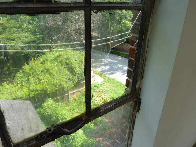 P1100167-2012-07-13-Lizzie-Chapel-Baptist-Church-Inman-Park-Atlanta-Sanctuary-Metal-window-broken-glass
