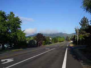 A few clouds cling to mountaintops west of Forest Grove