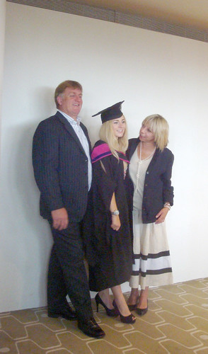 Proud parents and their daughter width=