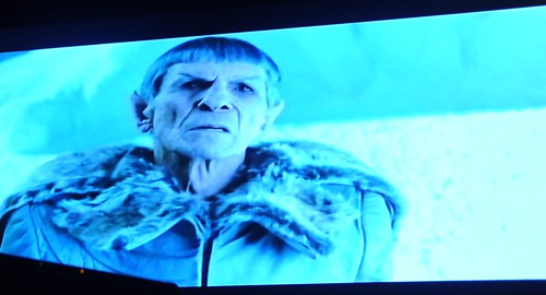 Spock, wearing a fur trimmed coat, tells his story of being marooned on a frozen planet, Delta Vega, Alpha Quadrant, fiction, Star Trek film 2009, on TV, Seattle, Washington, USA by Wonderlane