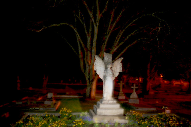 creepy grave graveyard night scary angel statue