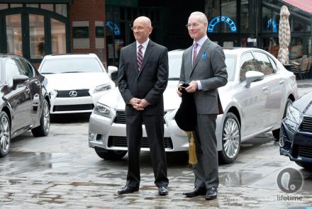 Tim Gunn and the Lexus guy standing by the cars