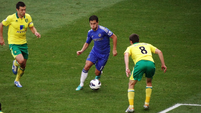 Chelsea's Eden Hazard takes on Norwich City's Jonny Howson