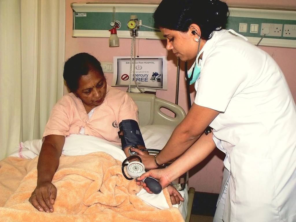 Woman receiving health care in India