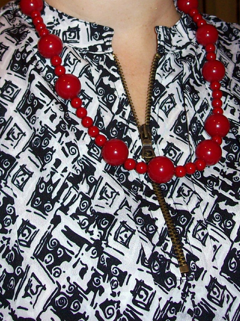 blouse/necklace detail