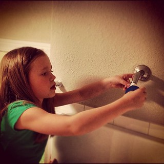 Never too early to teach a girl some plumbing skills. Hazel installed the new shower head all by herself.  #missindependent