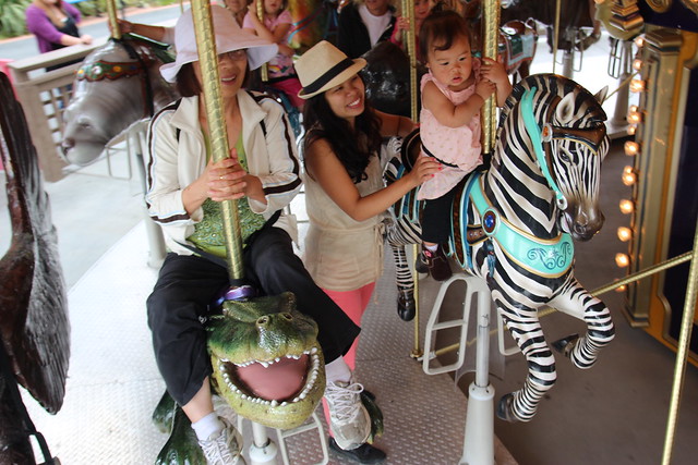 Riding the carousel with Mama and Grandma