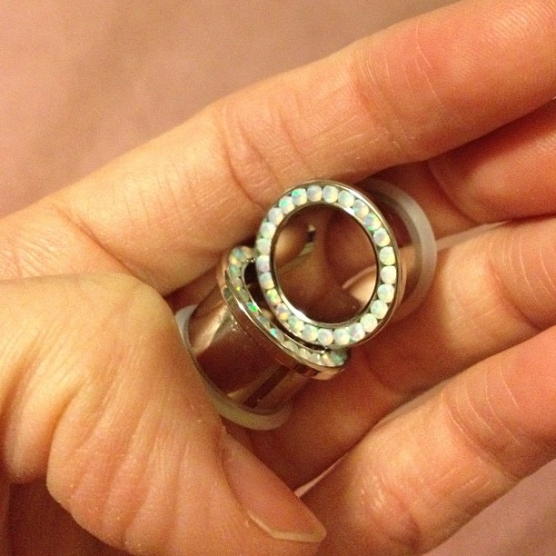 the customary fourth anniversary gift: bling tunnels.