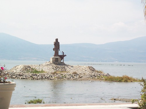 Statue in lake