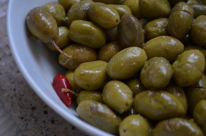 Bowl of Palestinian Olives with Red Pepper