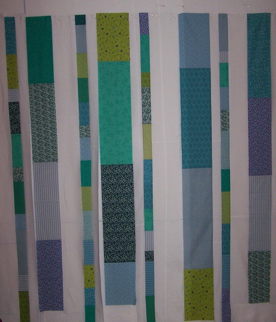 Blues Greens Strip Quilt on Wall