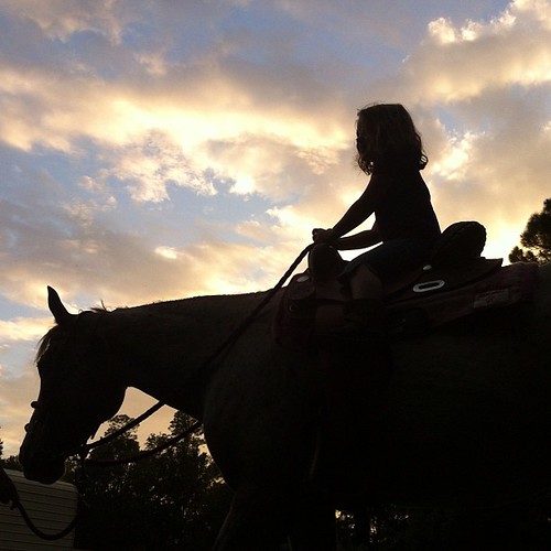 A girl on a horse. My girl. #silhouette #countryliving #nofilter