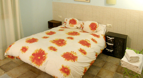 Habitació triple amb llit per a dos persones