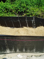 double row of silt fence with hay and polymers in the middle