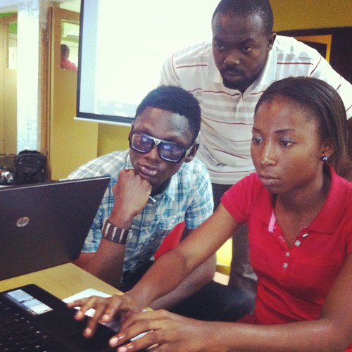 Three young Nigerians working on a way to simplify and visualize technical, complicated information to be more easily understood by the general population
