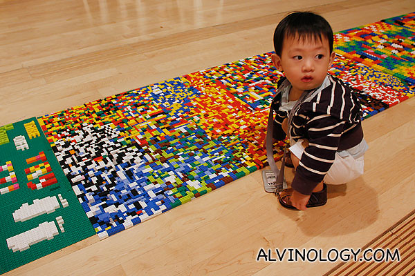 Asher checking out the LEGO reflexology path 