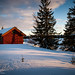 Cabin in winter landscape