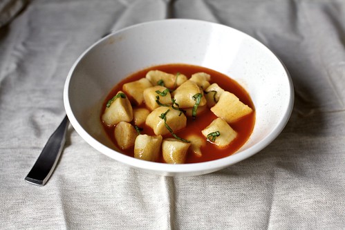 gnocchi assembled with tomato broth