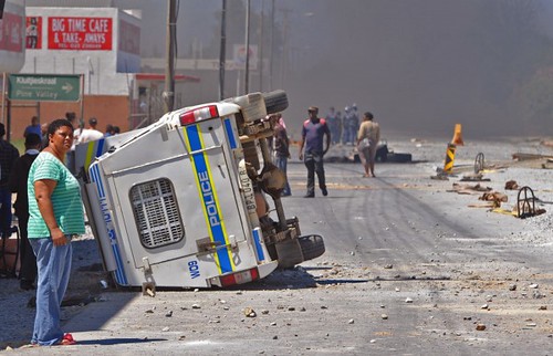 Police vehicle overturned in the Cape province amid an agricultural workers strike in the Republic of South Africa. An agreement to end the strike had been announced by the Allied Agricultural Workers Union an affiliate of COSATU. by Pan-African News Wire File Photos