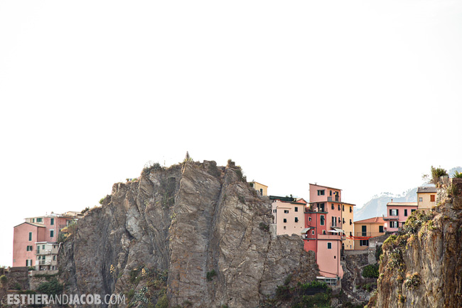View of pastel colored buildings of Corniglia along Sentiero Azzurro Blue Trail | What to Do in Cinque Terre Italy