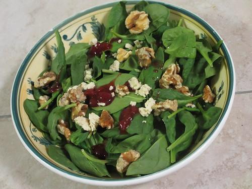 Spinach Salad with Walnuts, Goat Cheese, and a touch of Cranberry Sauce