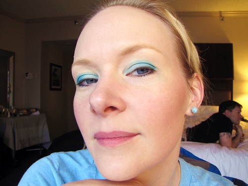 blue eyeshadow and matching earrings