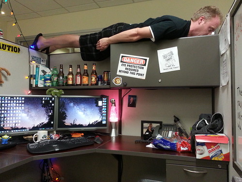 Planking on top of my cubicle.