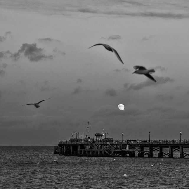 Full moon over Swanage Pier