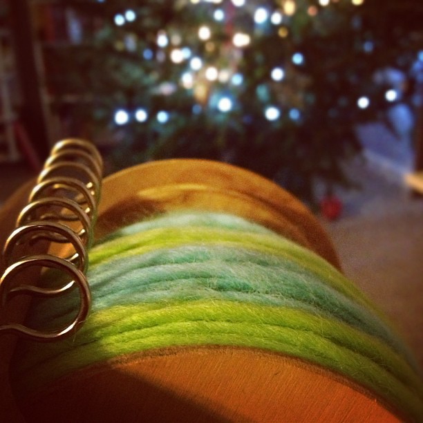 Spinning this month's Yarn Mail by Christmas tree-light.