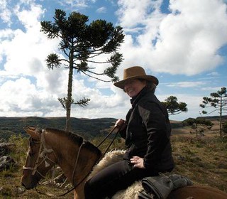Ona Kiser on a Crioulo horse in Brazil.
