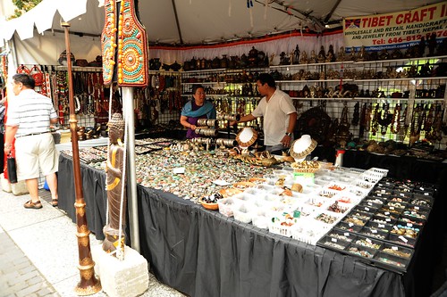 Tibetan crafts table, jewelry, Tibetan long horn, Buddha statue, ornate vest, Kalachakra for World Peace, Washington D.C., USA by Wonderlane