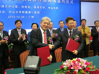 DG Kenneth exchanging signed Letter of Intent with Wang Liji, Director General of MoH