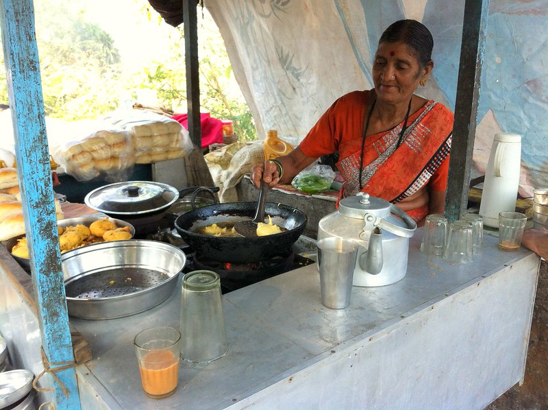 Old couple running tea stall at Madh