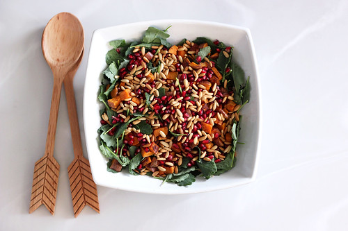 Baby Kale and Roasted Sweet Potato Salad with Pomegranate and Toasted Pine Nuts