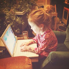 My new tiny intern. She's in charge of scheduling cupcake breaks and finding cute kitty YouTube videos.