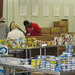 November 15, 2012 Volunteers at the Food Bank of Delaware sort through donations.